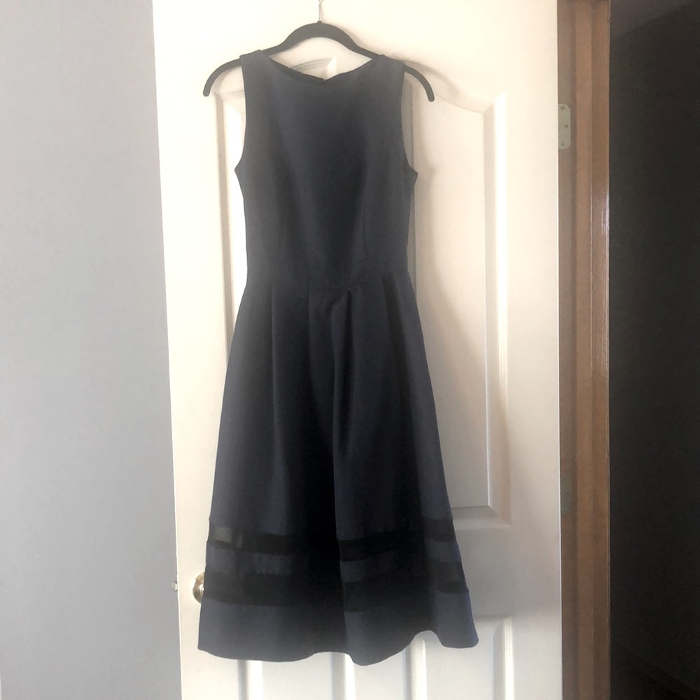 Navy Dress with tulle striped bottom.